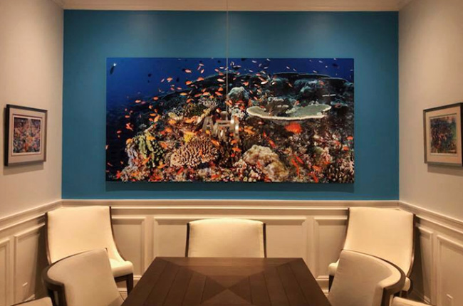 metal photo art with fish images on display at restaurant