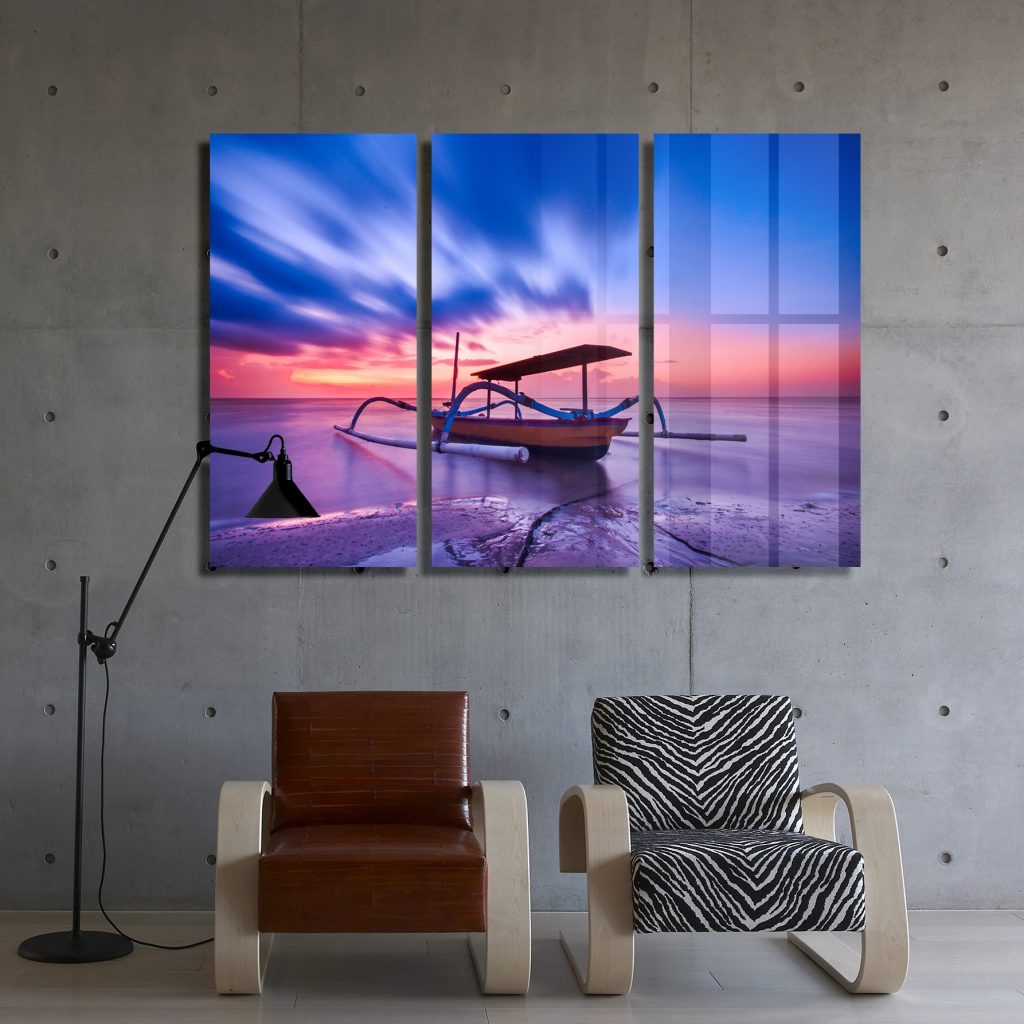 metal prints over chairs inside building