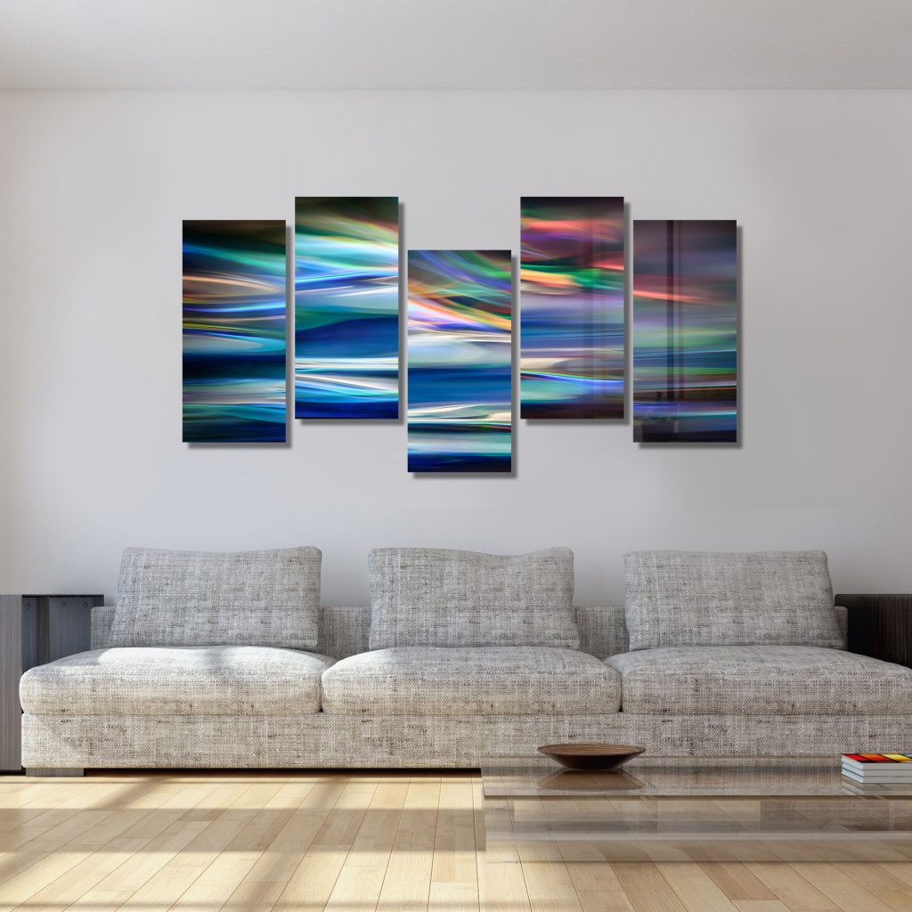 metal prints hanging on wall in living room