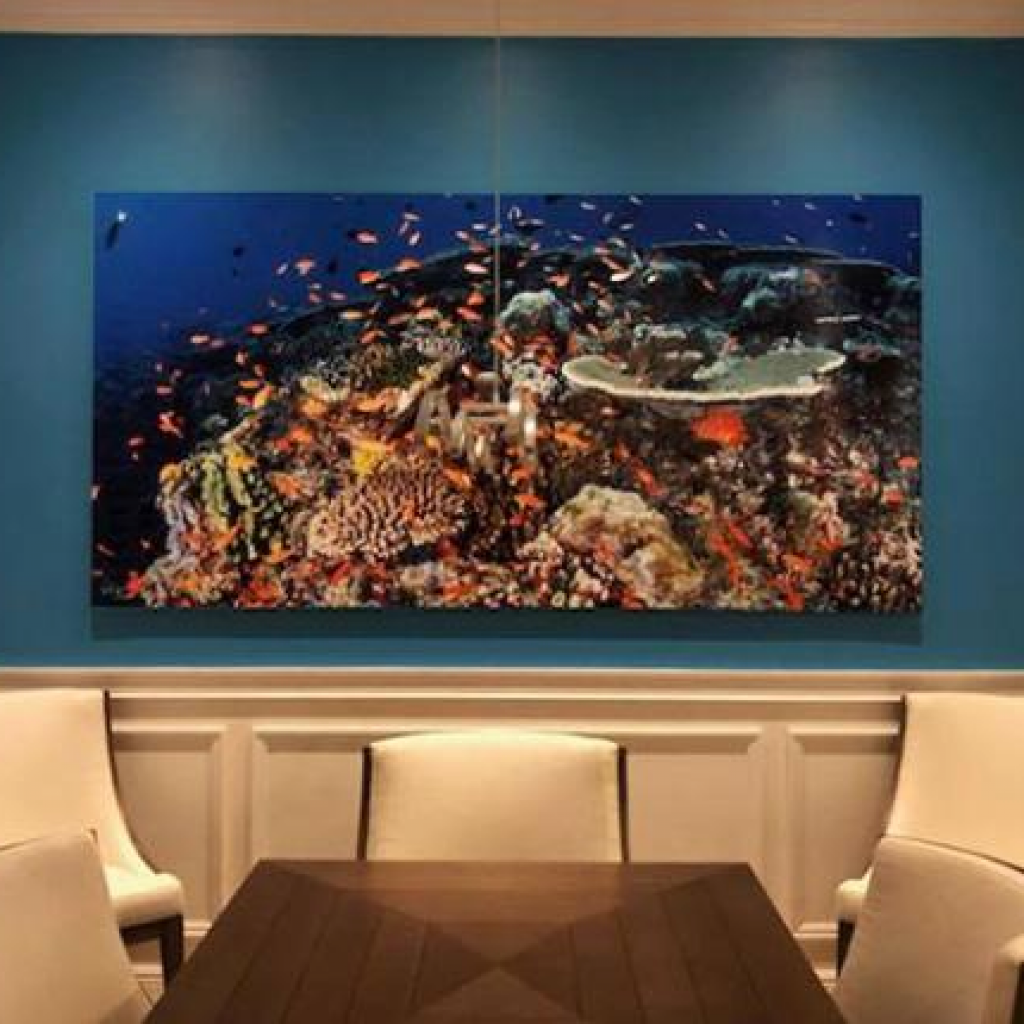 metal photo art with fish images on display at restaurant