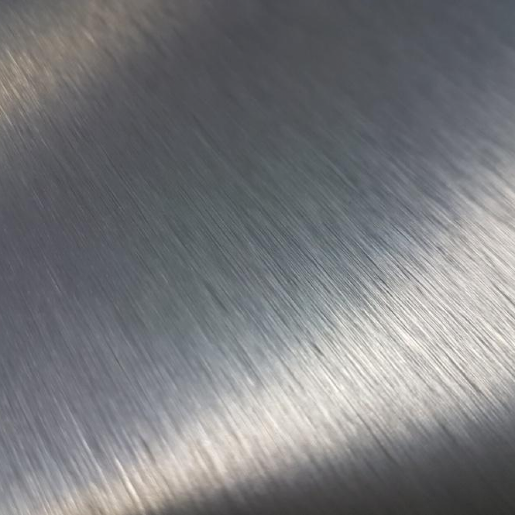 a grey brushed steel or aluminium metal background